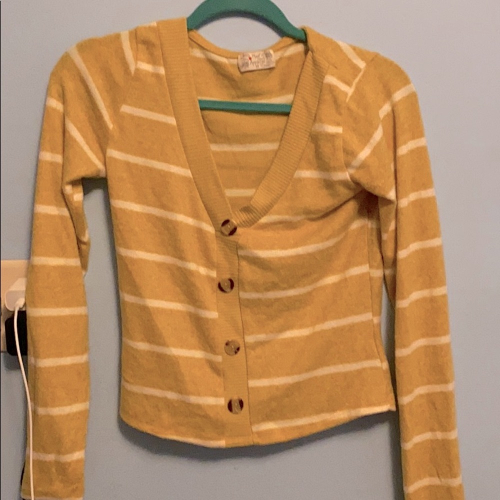 a yellow v-neck